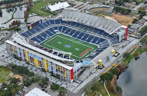Citrus bowl stadium - Nov 17, 2022 · The venue hosts three bowl games every year: Citrus Bowl, Cure Bowl, and Cheez-It Bowl (previously Camping World and Russell Athletic). Camping World Stadium was the former home of the UCF Knights football (1979-2006) and Orlando City SC (2011-2016). 